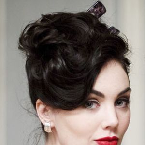 Fotoğraf Poppy Corby-Tuech