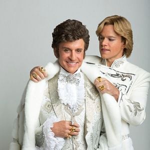 Fotoğraf Behind the Candelabra